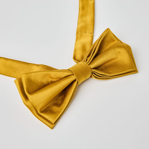 Moño Rocca amarillo – Next trajes